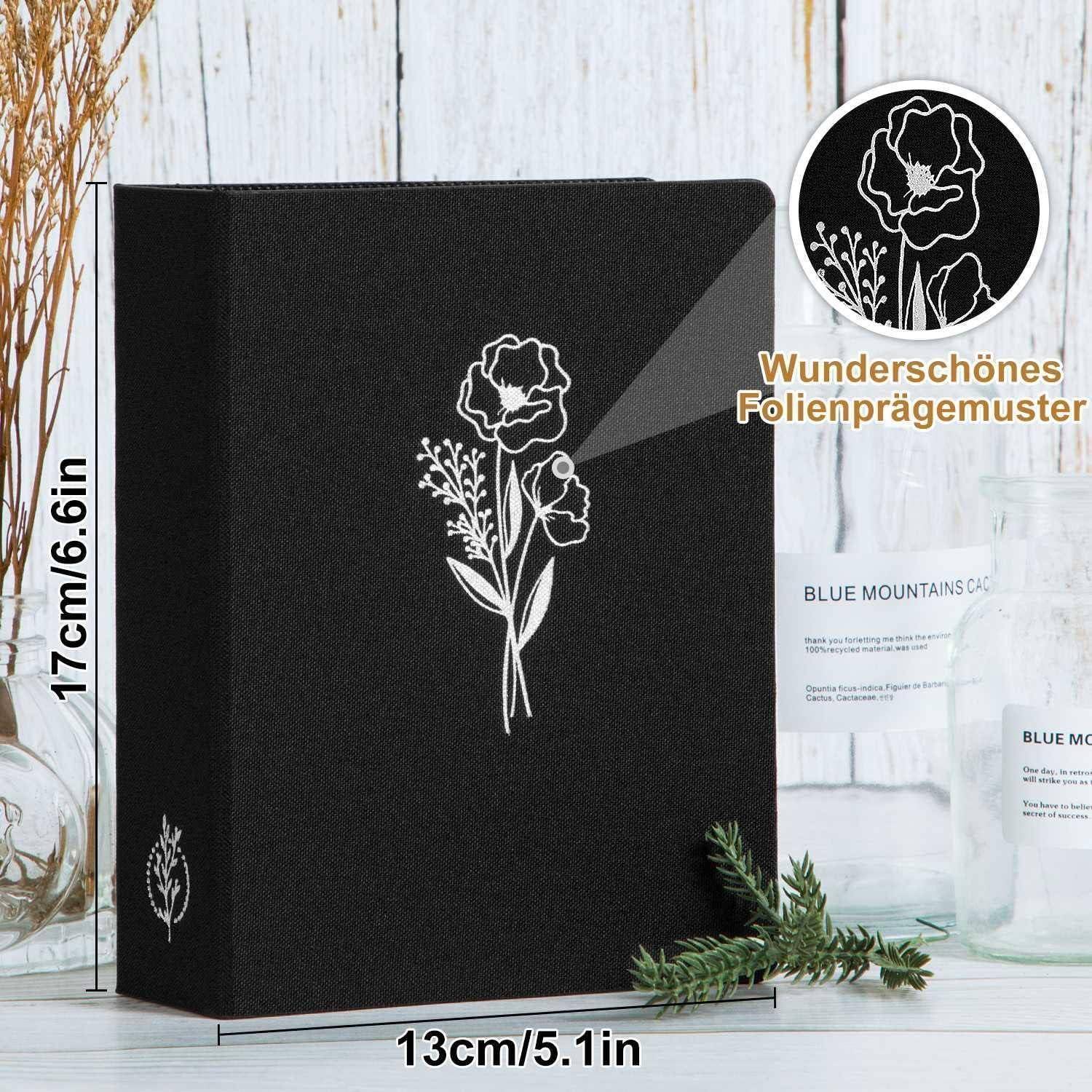 Ein schwarzes Hardcover-Buch mit einem weißen Blumendesign. Der Text auf Deutsch hebt die wunderschöne Folienprägung hervor. Das Buch misst 17 cm x 13 cm. Ein Kiefernzweig schmückt die Basis.