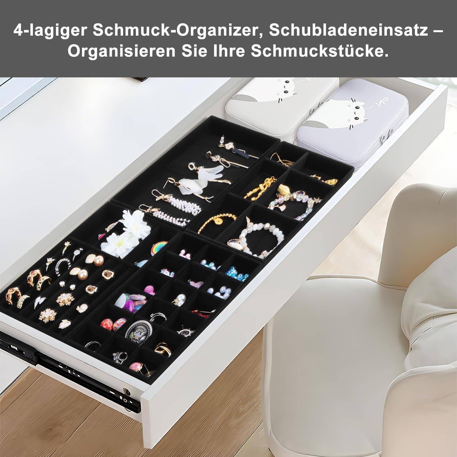 4-lagiger Schmuck-Organizer, Schubladeneinsatz – Organisieren Sie Ihre Schmuckstücke. Eine ordentlich organisierte Schublade mit verschiedenen Schmuckstücken in Fächern.