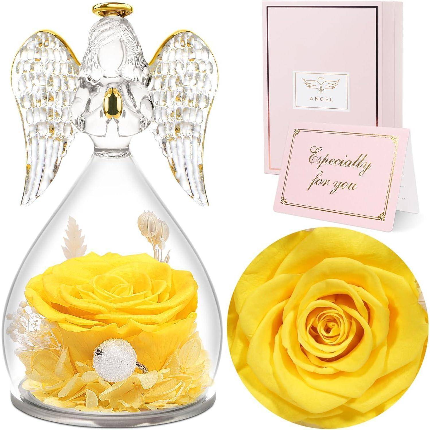 Glas-Engelsfigur mit einer konservierten gelben Rose im Inneren, neben einer rosa Karte mit der Aufschrift 