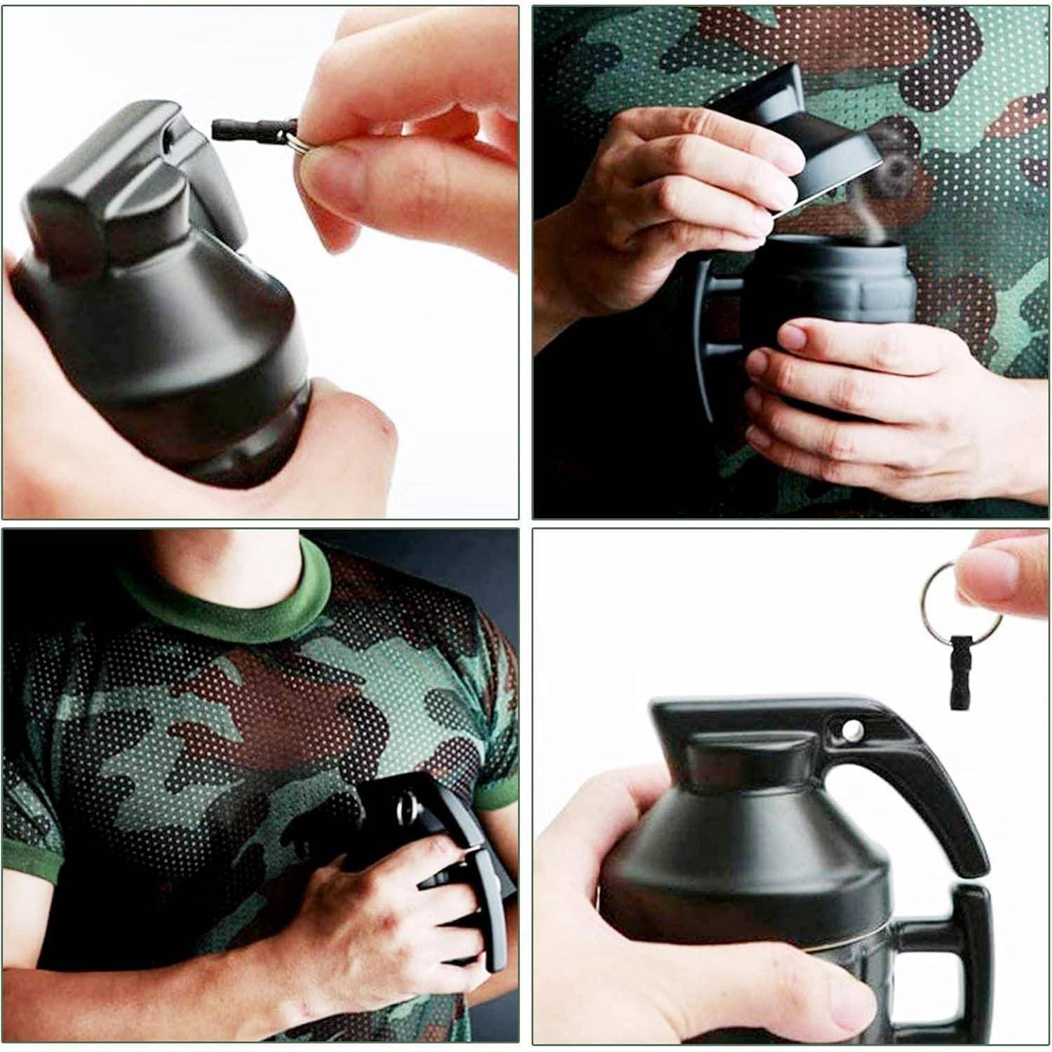 Eine Person demonstriert die Verwendung einer schwarzen, granattenförmigen Tasse, indem sie den Zapfen zieht und den Deckel öffnet und dabei ein Camouflage-Shirt trägt.
