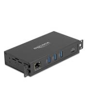 Ein schwarzes Metallgerät mit einem Ethernet-Anschluss und mehreren USB-Ports an der Vorderseite, entwickelt für Konnektivität und Netzwerkzwecke.