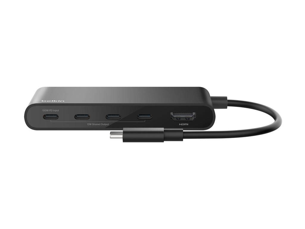 Ein schwarzer USB-C-Hub mit mehreren Anschlüssen, darunter USB und HDMI, verbunden durch ein kurzes Kabel.