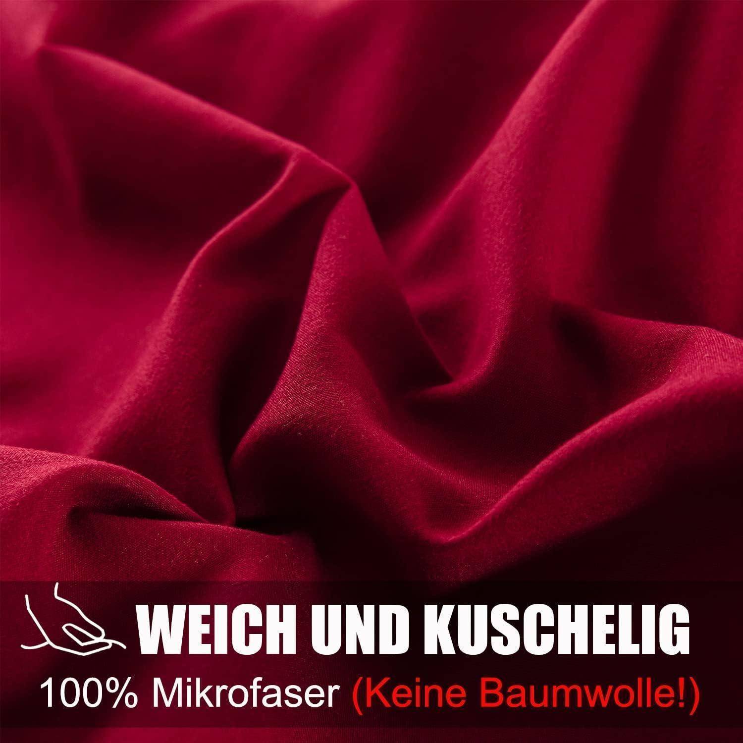 Roter Stoff mit Text: Weich und kuschelig, 100% Mikrofaser (Keine Baumwolle!).