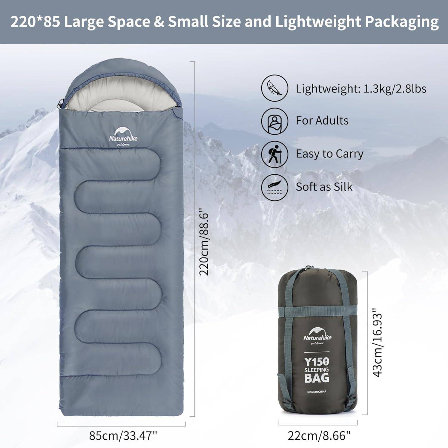 Schlafsack vor einer verschneiten Bergkulisse, mit Abmessungen: 220 cm/86,6
