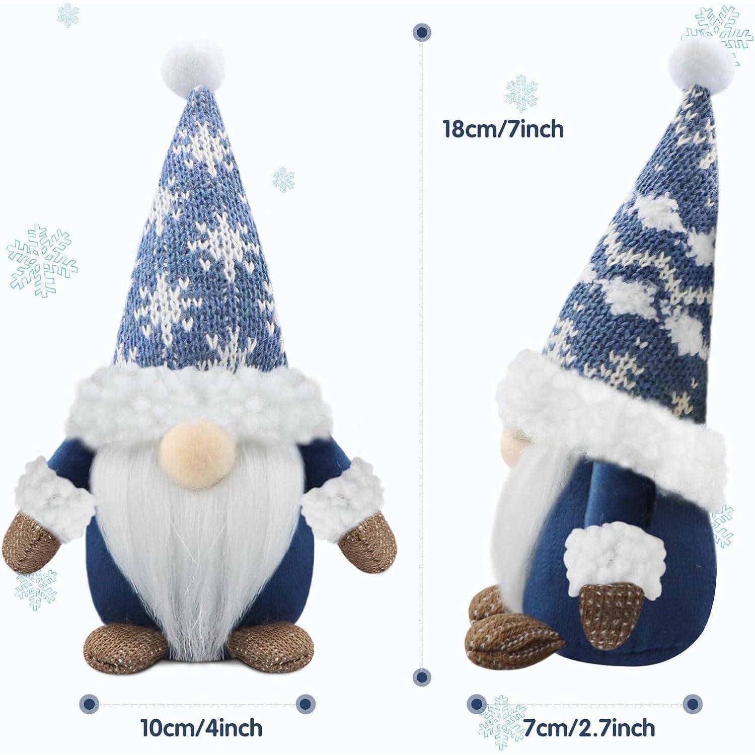 Zwei Plüsch-Gartenzwergfiguren mit blauen Strickmützen, einer steht 18 cm groß und der andere 10 cm, beide mit weißen Bärten und detaillierten Handschuhen.