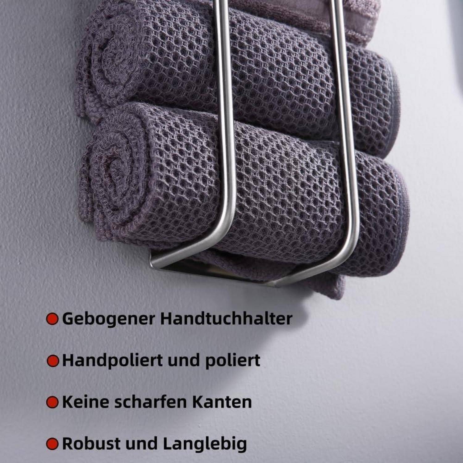 Handtuchhalter mit drei aufgerollten grauen Handtüchern, an einer Wand montiert. Aufgeführte Merkmale umfassen geschwungenes Design, polierten Finish und Langlebigkeit.