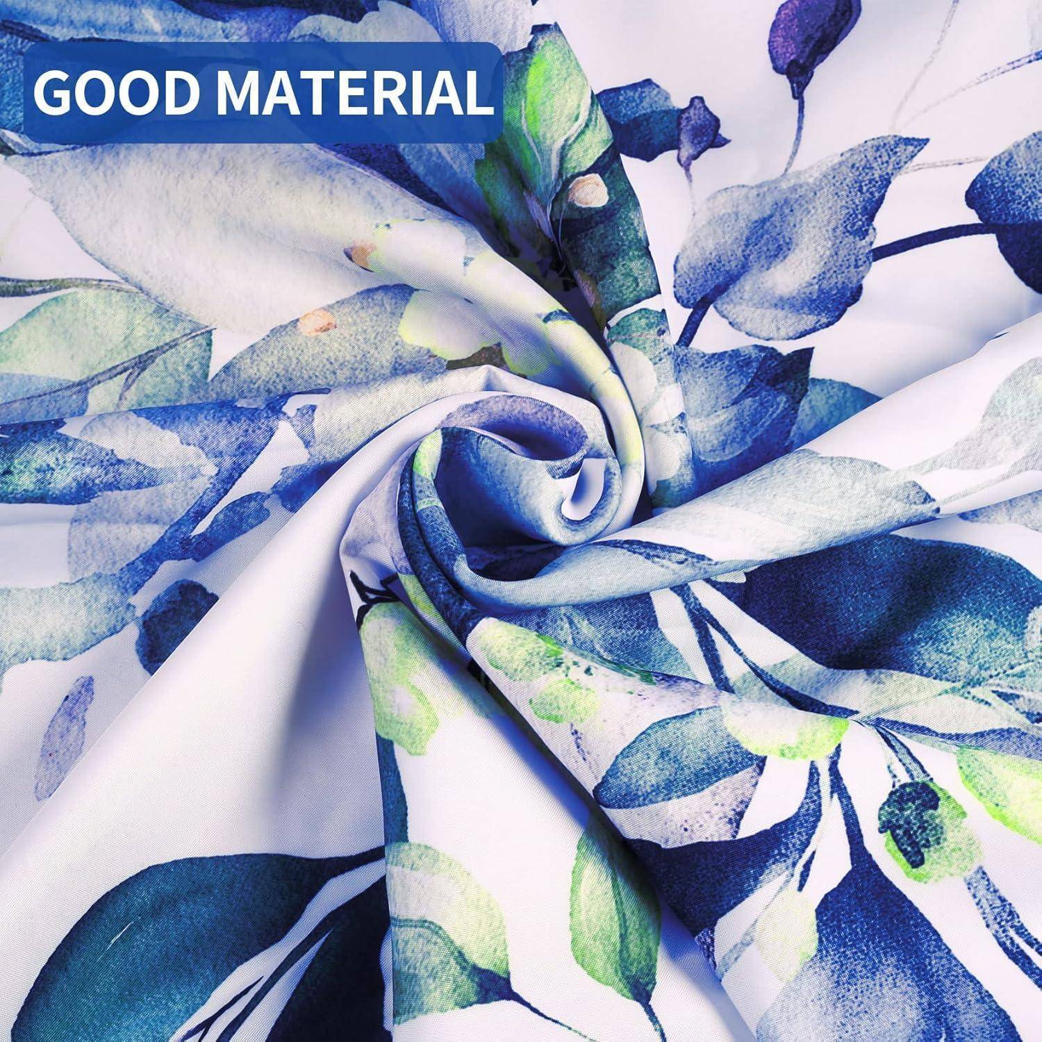 Eine Nahaufnahme eines Stoffes mit einem blauen und grünen Aquarell-Blättermuster. Überlagerter Text liest sich als ‚Good Material' in Weiß auf einem blauen Banner.