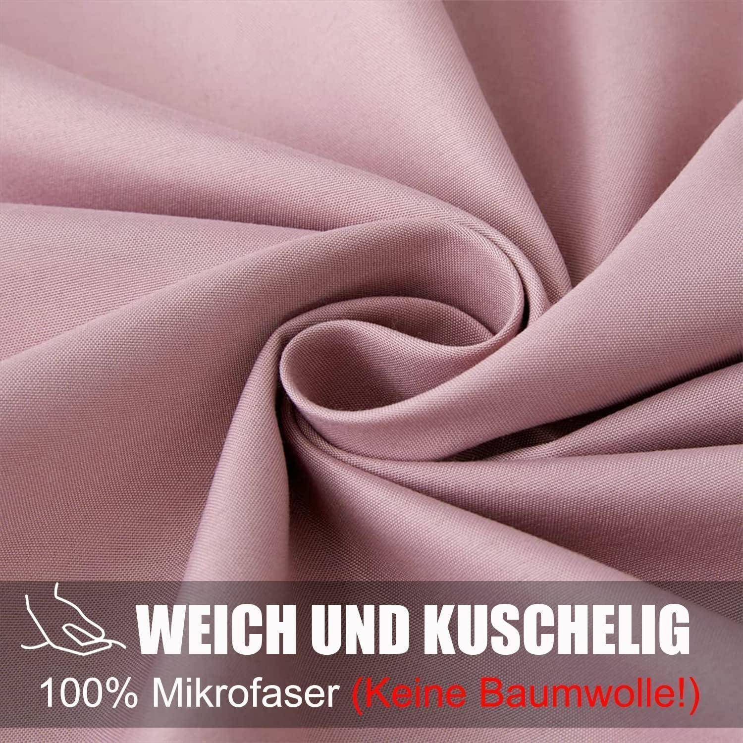 Rosa Mikrofaser-Stoff Nahaufnahme, die seine weiche und glatte Textur präsentiert. Text lautet: 'WEICH UND KUSCHELIG 100% Mikrofaser (Keine Baumwolle!)