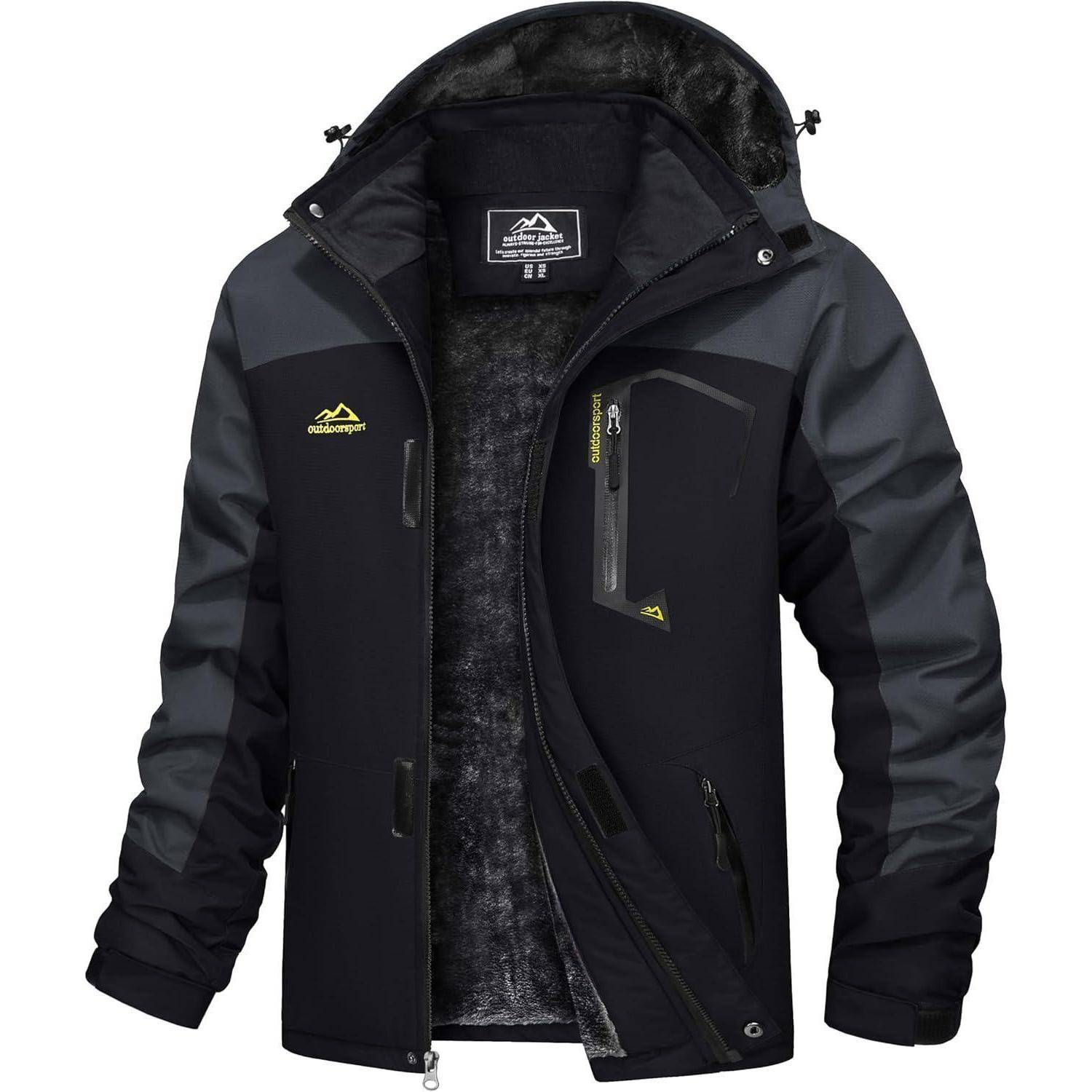 Eine schwarze wasserdichte Outdoor-Jacke mit grauen Ärmeln, ausgestattet mit mehreren Reißverschlusstaschen und einem Fleecefutter für Wärme.