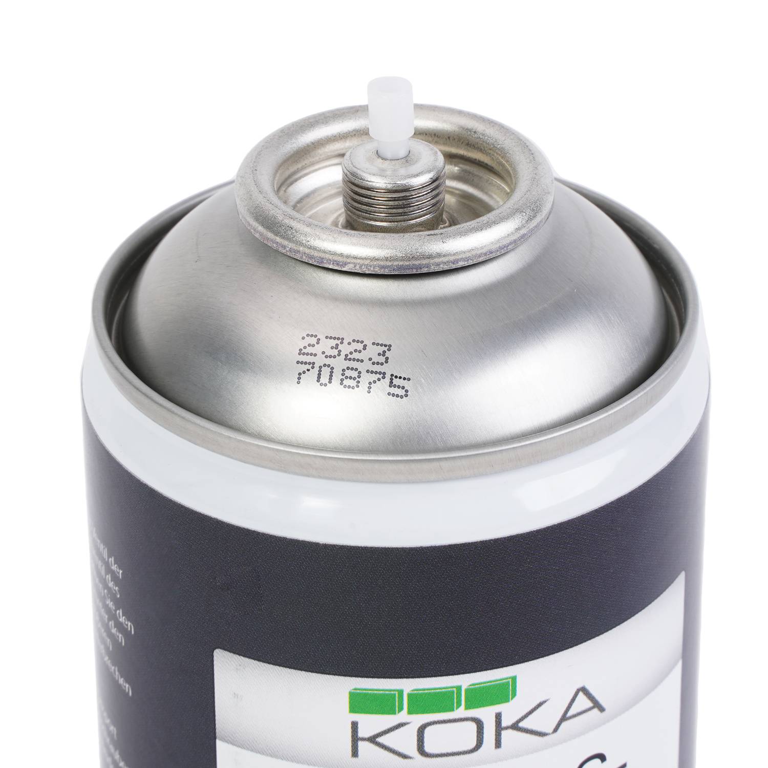 Nahaufnahme einer Sprühdose mit einer weißen Düse. Das Etikett zeigt den Markennamen 'KOKA'. Die Dose erscheint unbenutzt und vollständig versiegelt.