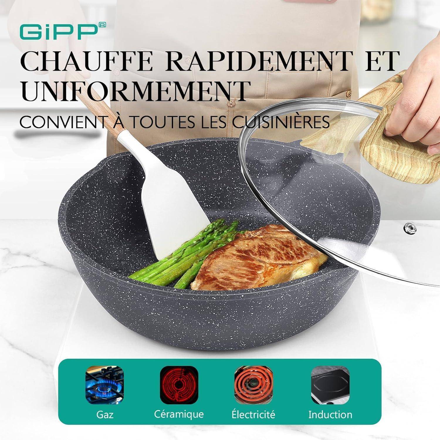 Eine Person, die Steak und Spargel in einer gefleckten Pfanne auf einem Herd zubereitet. Text lautet: 'Erhitzt schnell und gleichmäßig. Geeignet für alle Herde.