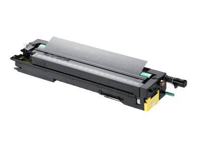 Eine schwarze Tonerkartusche für einen Laserdrucker mit erkennbaren Anschlüssen und mechanischen Komponenten, die auf einer weißen Oberfläche liegt.