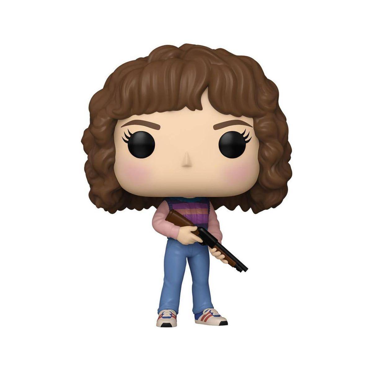 Eine Vinylfigur mit lockigem braunem Haar hält ein Gewehr und trägt einen violetten und pinken Pullover, blaue Jeans und Turnschuhe.