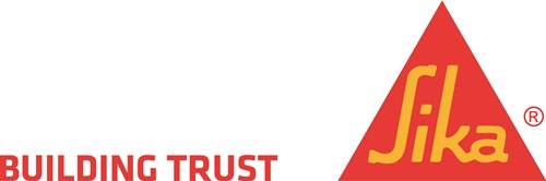 Ein teilweiser Ausschnitt des Wortes 'TRUST' in fett gedruckten roten Buchstaben, mit einer roten geometrischen Form in der unteren rechten Ecke.