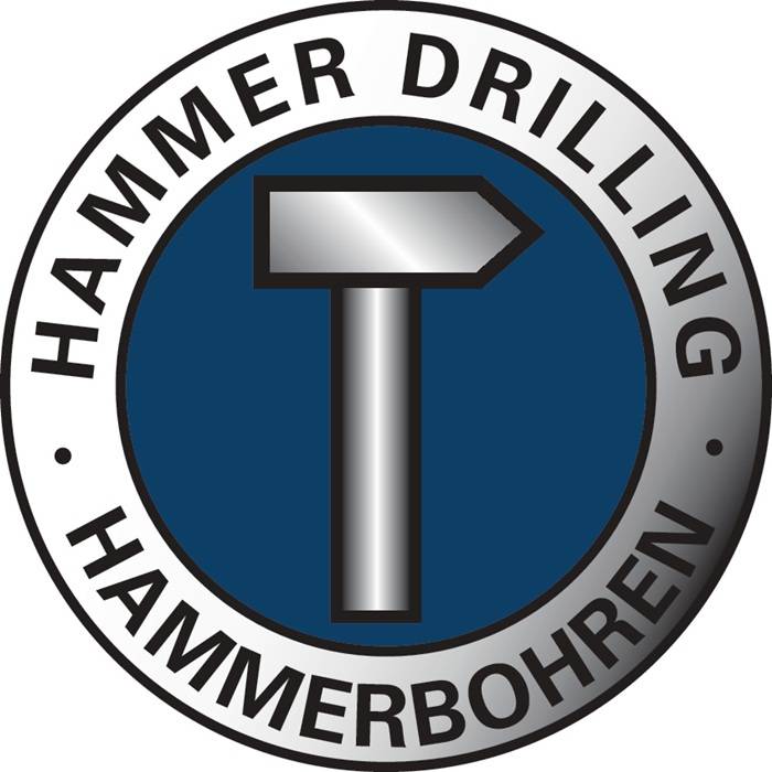 Ein kreisförmiges Logo mit einem Hammersymbol in der Mitte. Text lautet 'HAMMER DRILLING' und 'HAMMERBOHREN'.