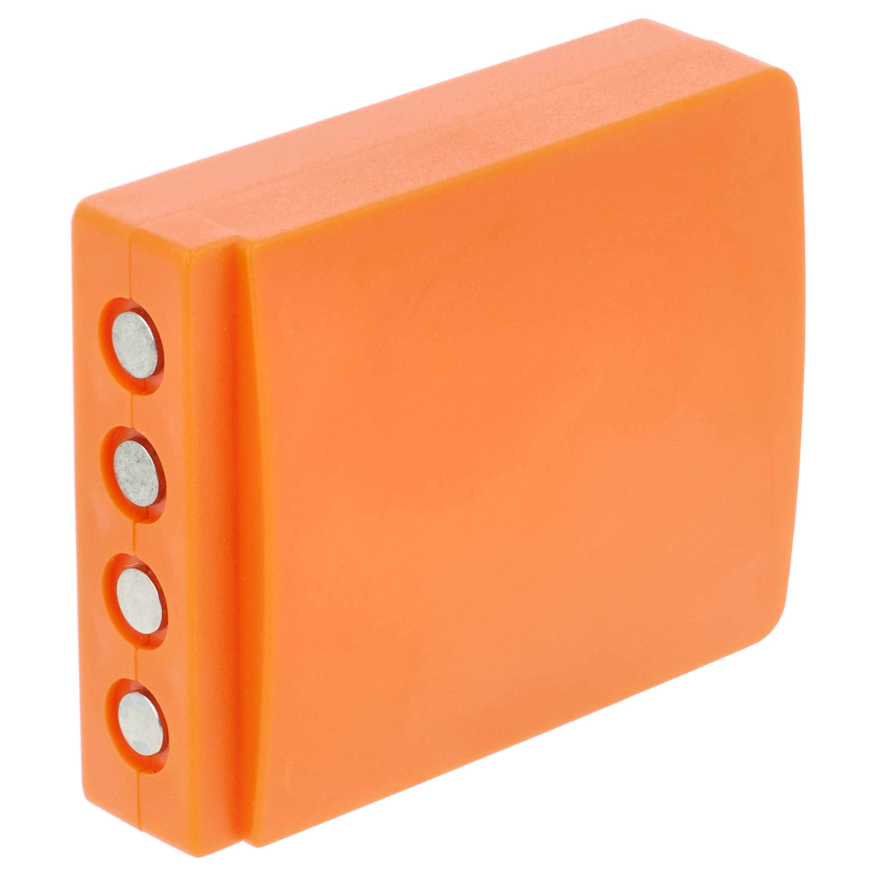 Ein orangefarbenes rechteckiges Gerät mit drei runden, silbernen Knöpfen, die seitlich vertikal ausgerichtet sind.