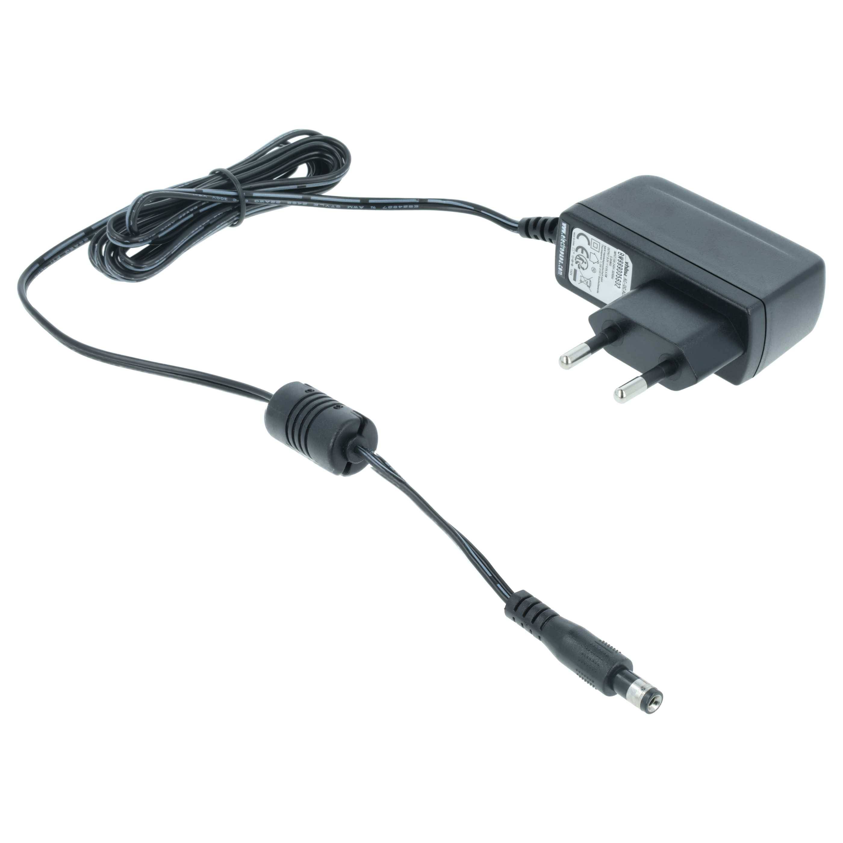 Ein schwarzes Netzteil mit einem europäischen Stecker und einem dünnen Kabel, das in einen DC-Stecker mündet.