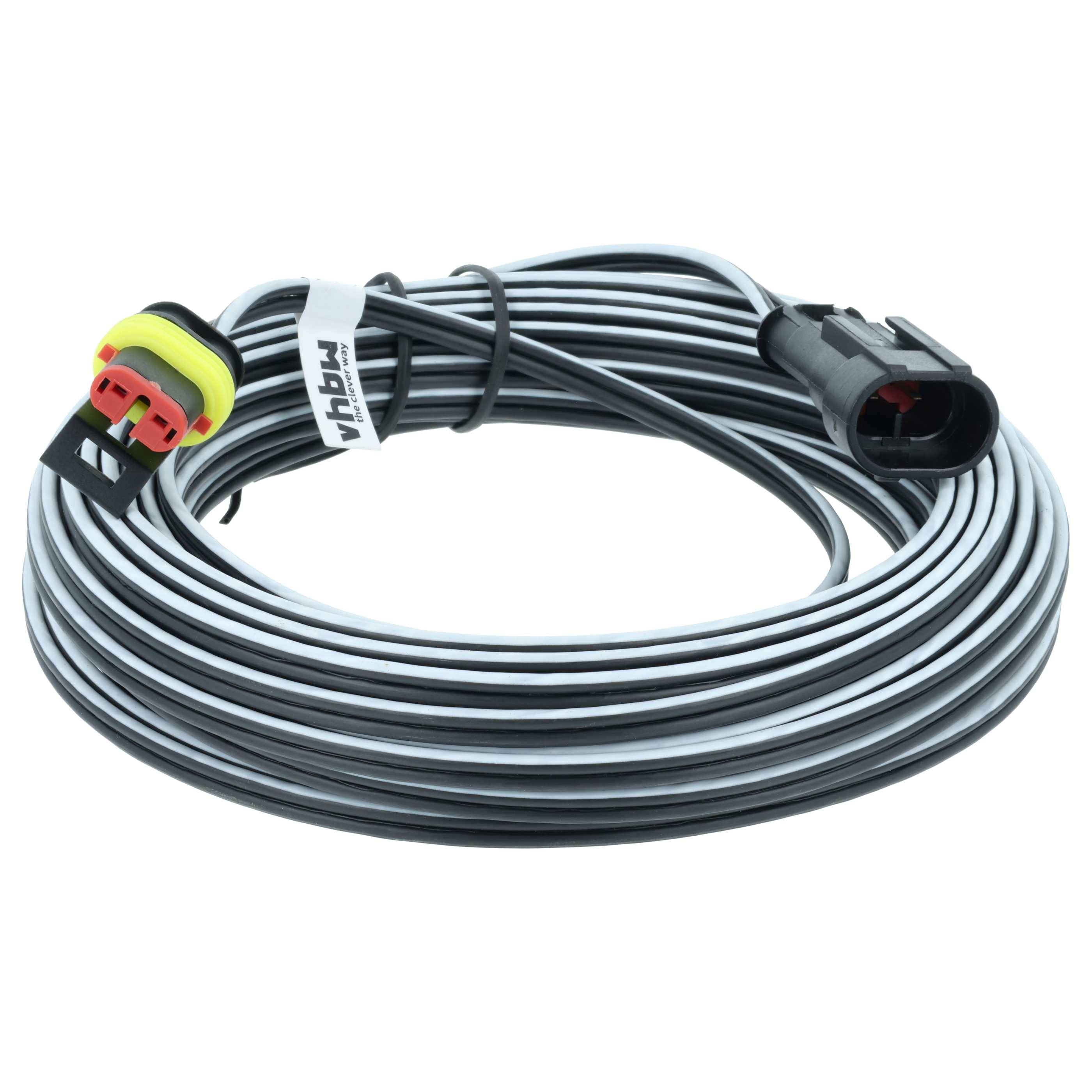 Ein gewickelter elektrischer Draht mit Anschlüssen an jedem Ende, einer gelb und rot, einer schwarz, gesichert mit einem beschrifteten weißen Streifen.