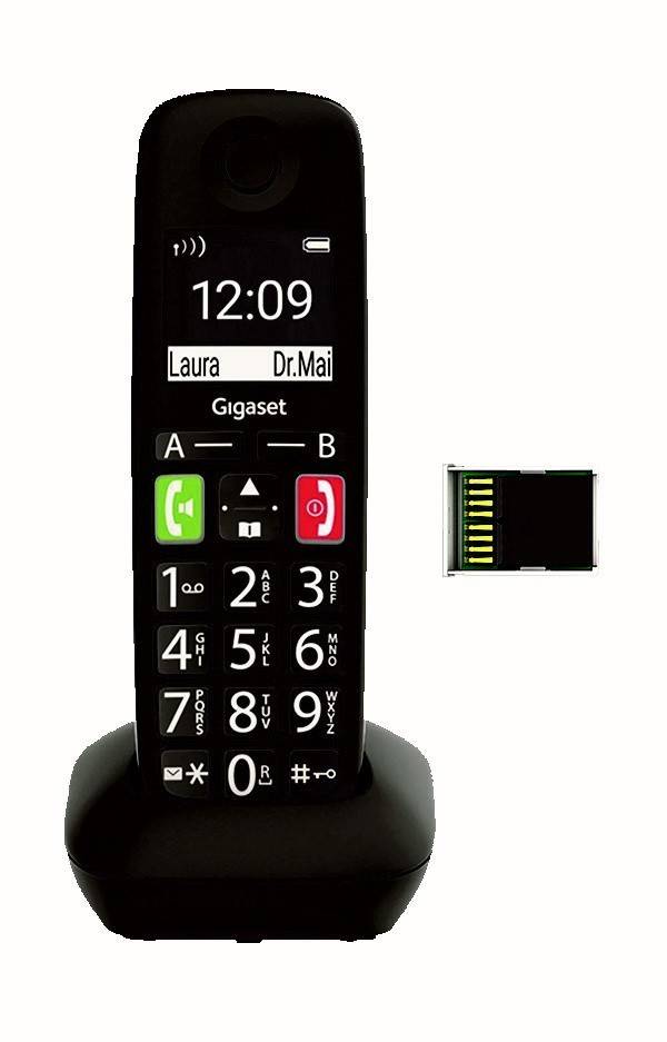 Schwarzes schnurloses Telefon mit Display, auf dem '12:09' angezeigt wird, mit Kontaktnamen 'Laura' und 'Dr. Mai' und großer numerischer Tastatur. USB-Gerät daneben.