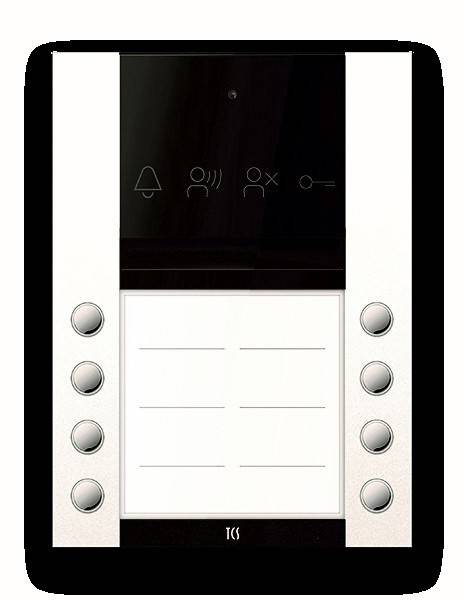 Ein weißes Gegensprechanlage-Panel mit einem Bildschirm, vier Symbolschaltflächen und sechs nummerierten Tasten. Die Symbole stellen eine Glocke, eine sprechende Person und Kreuzsymbole dar.