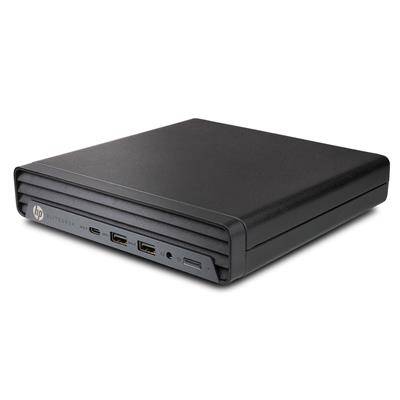 Ein kompaktes, schwarzes elektronisches Gerät mit mehreren USB- und HDMI-Anschlüssen, höchstwahrscheinlich ein Mini-Desktop oder Media-Player, auf einem weißen Hintergrund.