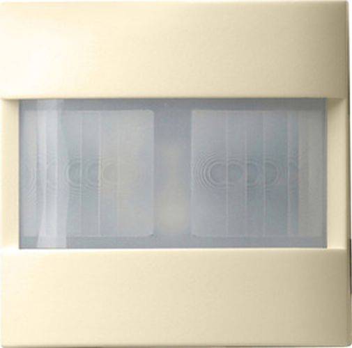 Ein beiger wandmontierter Bewegungssensor mit einem Doppel-Infrarot-Detektionsobjektiv.