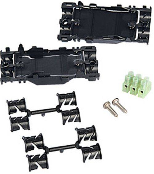 Kunststoff-Komponenten, Schrauben und grüne Verbinder sind auf einem weißen Hintergrund angeordnet, wahrscheinlich zur Montage oder für Fertigungszwecke.