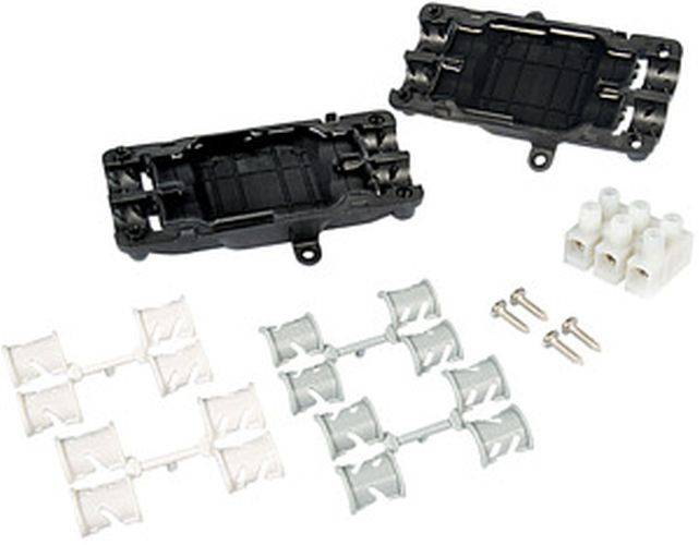 Kunststoff-Chassis-Set mit Schrauben, das verschiedene Teile zur Modellmontage umfasst, einschließlich schwarzer Grundplatten, weißer und grauer Verbinder.