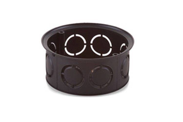 Ein schwarzer Metallring mit kreisförmigen Ausschnittmustern an den Seiten, der einem dekorativen Halter oder Behälter ähnelt.