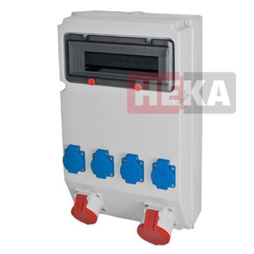 Ein weißer Elektroverteilkasten mit drei blauen Steckdosen und zwei roten Schaltern, im oberen rechten Eck mit 'HEKA' beschriftet.