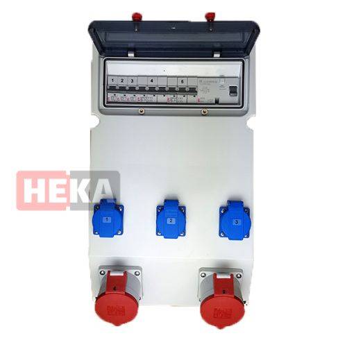 Eine elektrische Stromverteilungsbox mit mehreren Sicherungsautomaten und Steckdosen. Der Markenname 'HEKA' ist auf der Box sichtbar.