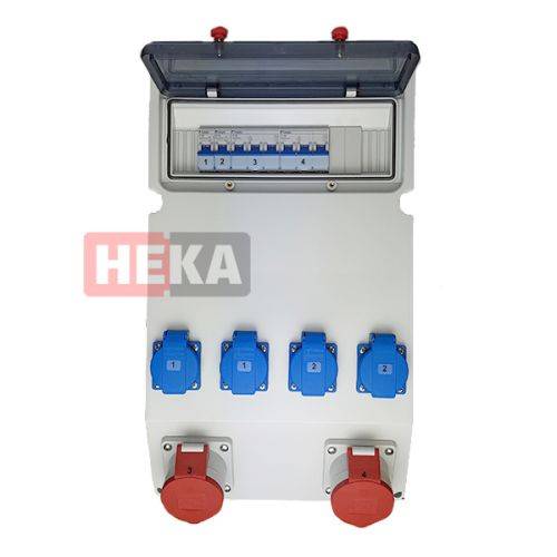 Elektrische Verteilertafel des Typs 'HEKA' mit vier blauen Steckdosen und drei roten Steckdosen, abgedeckte Bedienblende mit beschrifteten Schaltern 1 bis 3.