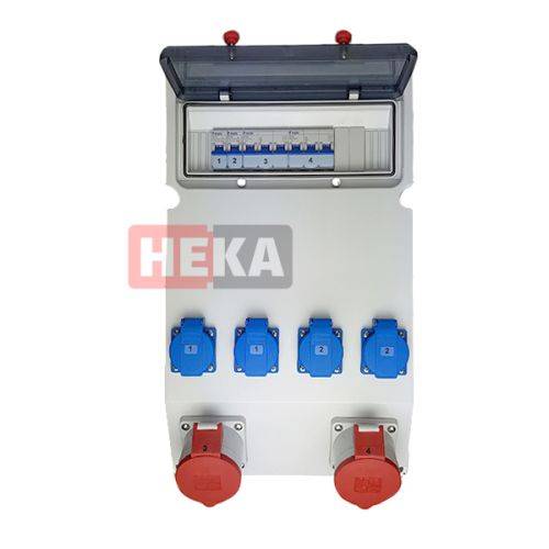 Elektrische Verteilerdose mit 'HEKA' Logo, ausgestattet mit sechs Anschlüssen (vier blaue, zwei rote) und einer Schutzabdeckung für Schalter.