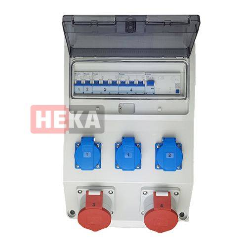 Elektrische Verteilerdose mit transparentem Deckel, die Sicherungsautomaten und vier Steckdosen beherbergt, mit Nummern beschriftet und mit einem 'HEKA' Logo versehen.