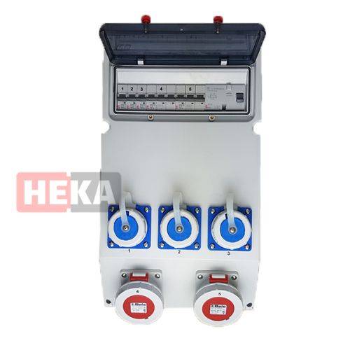 Ein elektrischer Schaltschrank mit transparentem Deckel, Sicherungsautomaten und sechs Steckdosen, auf der Frontplatte mit 'HEKA' beschriftet.