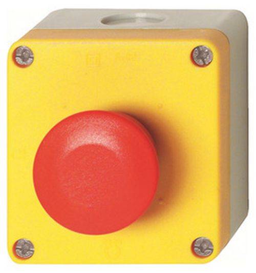 Ein gelber Notaus-Knopf, der auf einer quadratischen Box montiert ist. Der Knopf ist groß und rot, und so gestaltet, dass er im Notfall schnell zugänglich ist.
