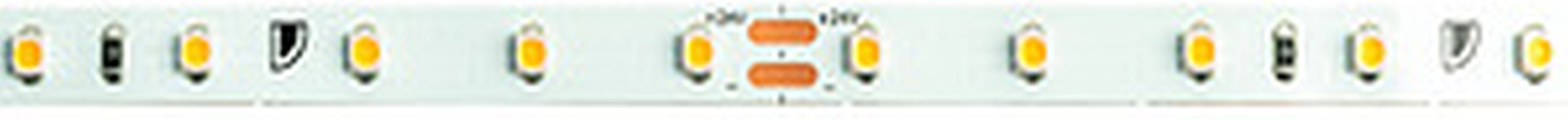 Nähere Ansicht eines verschwommenen Bedienfelds mit zwei orangefarbenen Tasten. Der Text und die Details sind undeutlich.