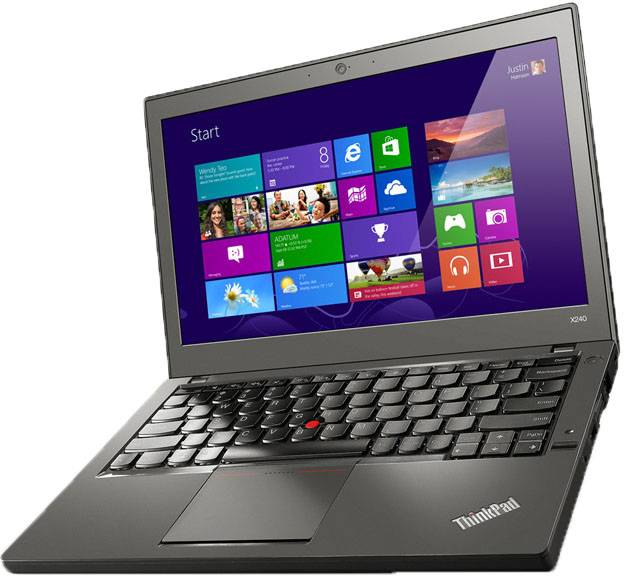 Ein Laptop, der einen Windows-Startbildschirm mit bunten Kacheln für Apps wie E-Mail, Kalender und mehr anzeigt.
