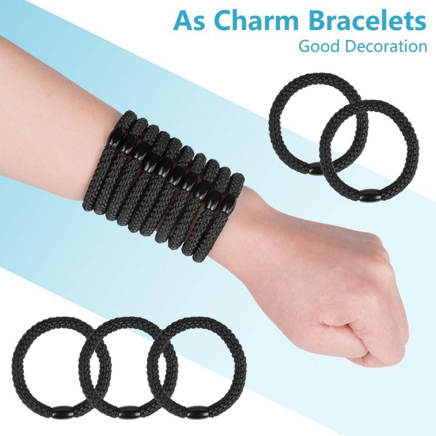 Ein Handgelenk mit mehreren schwarzen Spiralarmbändern, wobei ähnliche Armbänder separat gezeigt werden. Text lautet: 