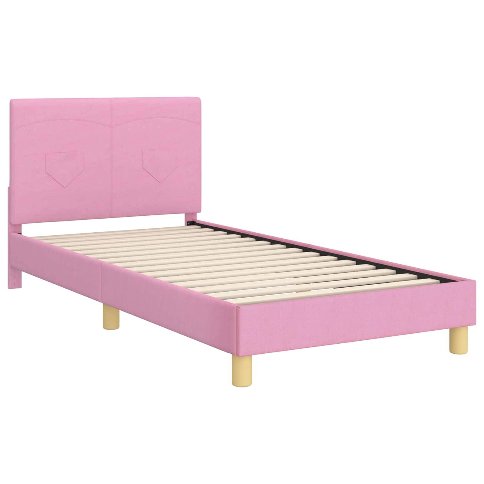 Ein pinker Einzelbettrahmen mit Kopfteil, Holzlatten und beigen zylindrischen Beinen, vor einem weißen Hintergrund platziert.