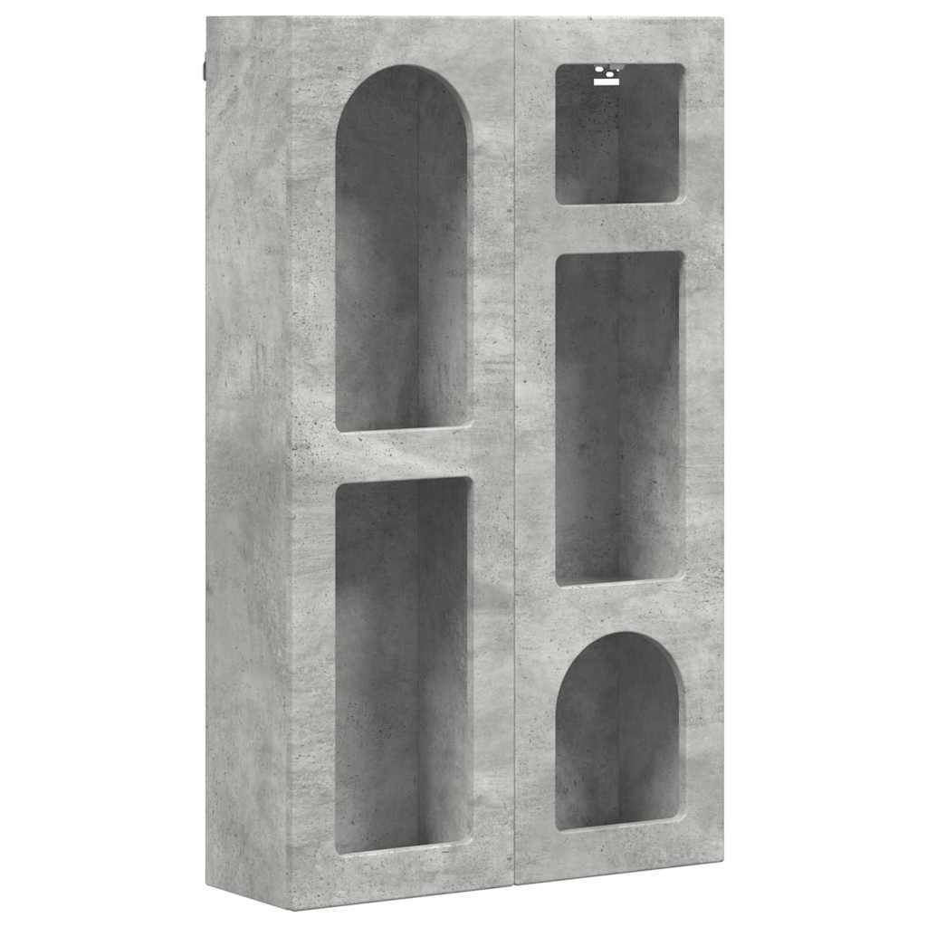 Betonwandelement mit vier rechteckigen und bogenförmigen Nischen zur Aufbewahrung oder Präsentation. Modernes, minimalistisches Design.