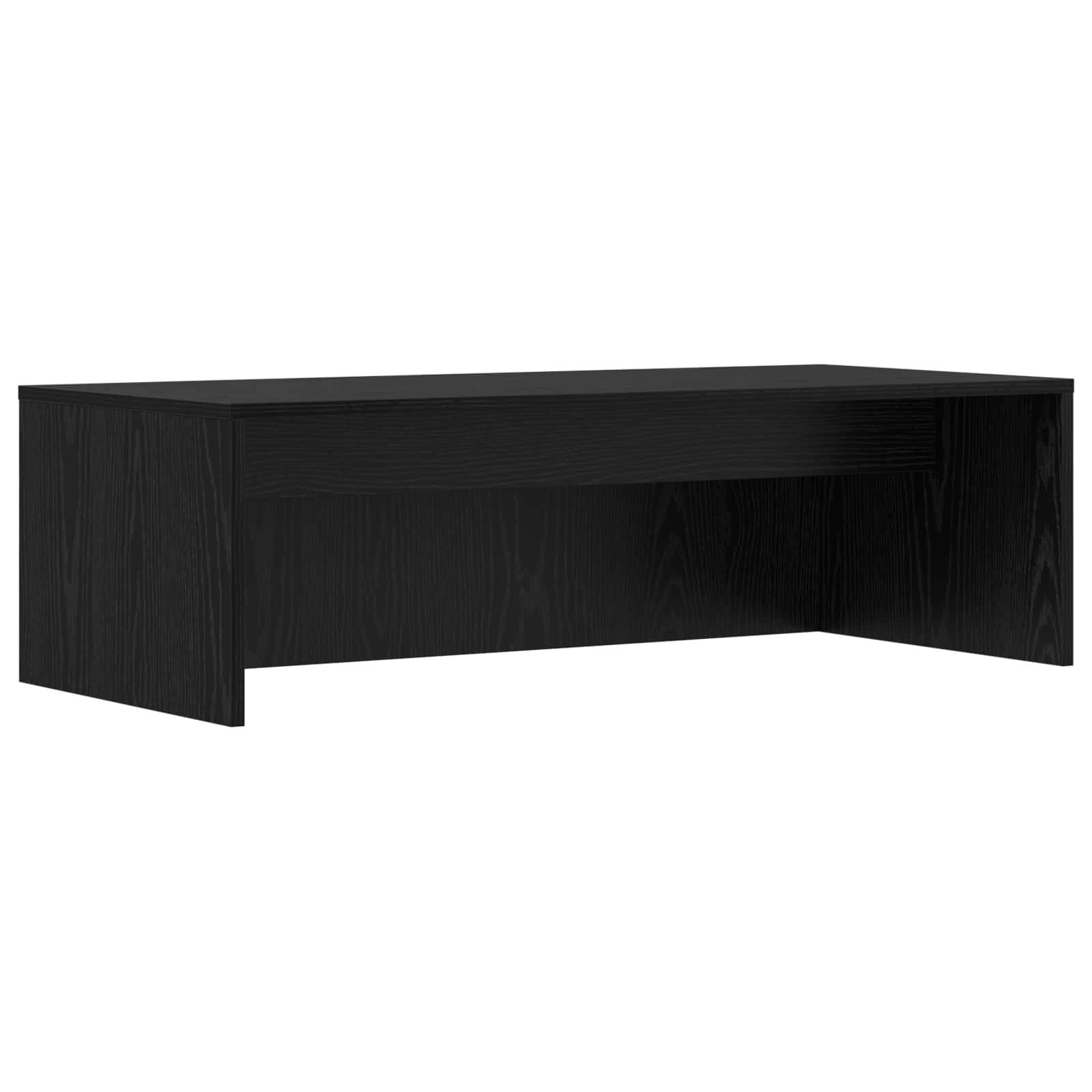 Ein einfacher schwarzer rechteckiger Schreibtisch mit glatten Oberflächen und minimalistischem Design. Keine Gegenstände oder Dekoration befinden sich auf oder um den Schreibtisch herum.