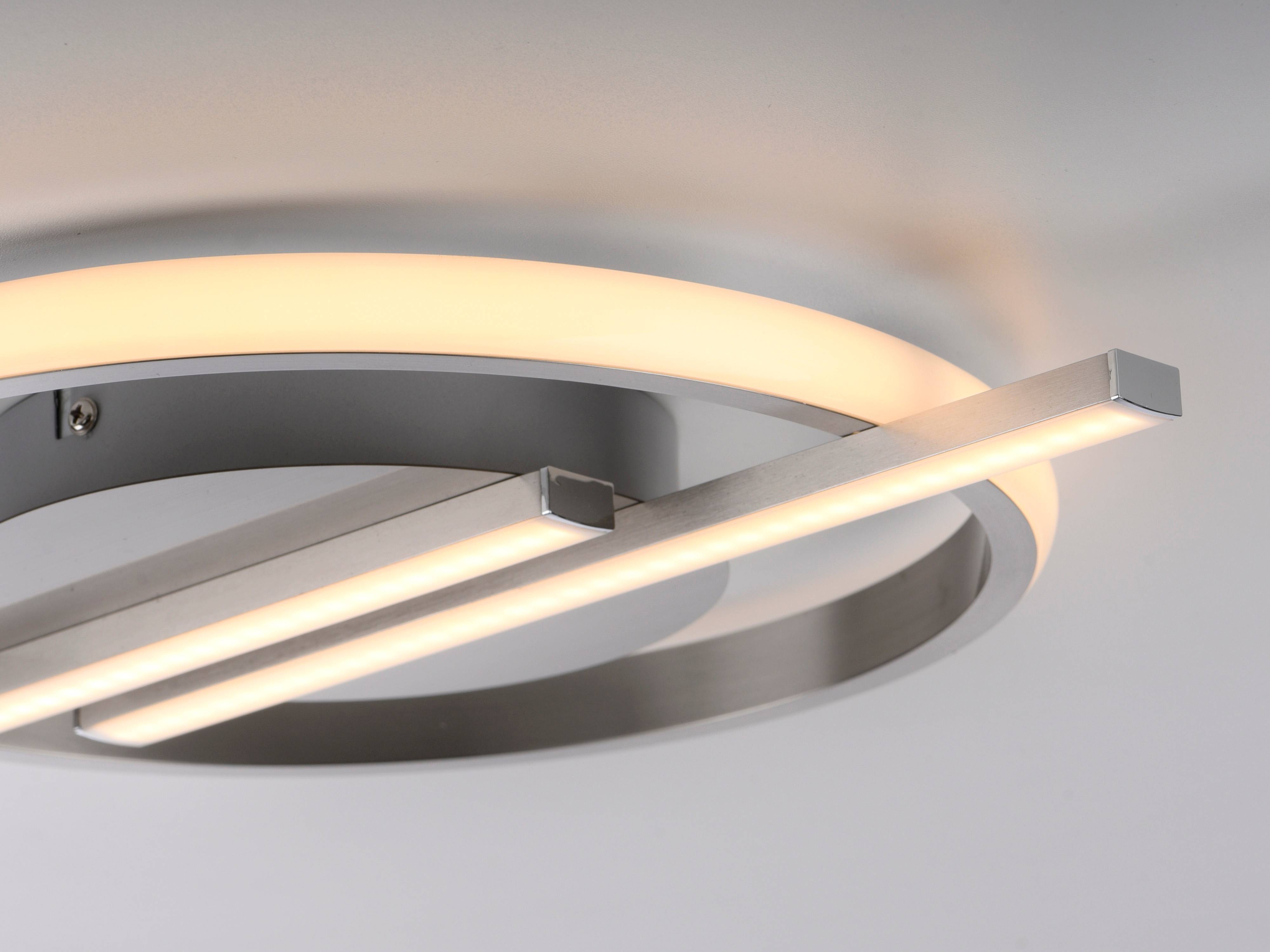 Eine moderne LED-Deckenleuchte mit kreisförmigen und linearen Elementen, die ein sanftes, warmes Leuchten ausstrahlt und eine zeitgenössische Atmosphäre schafft.