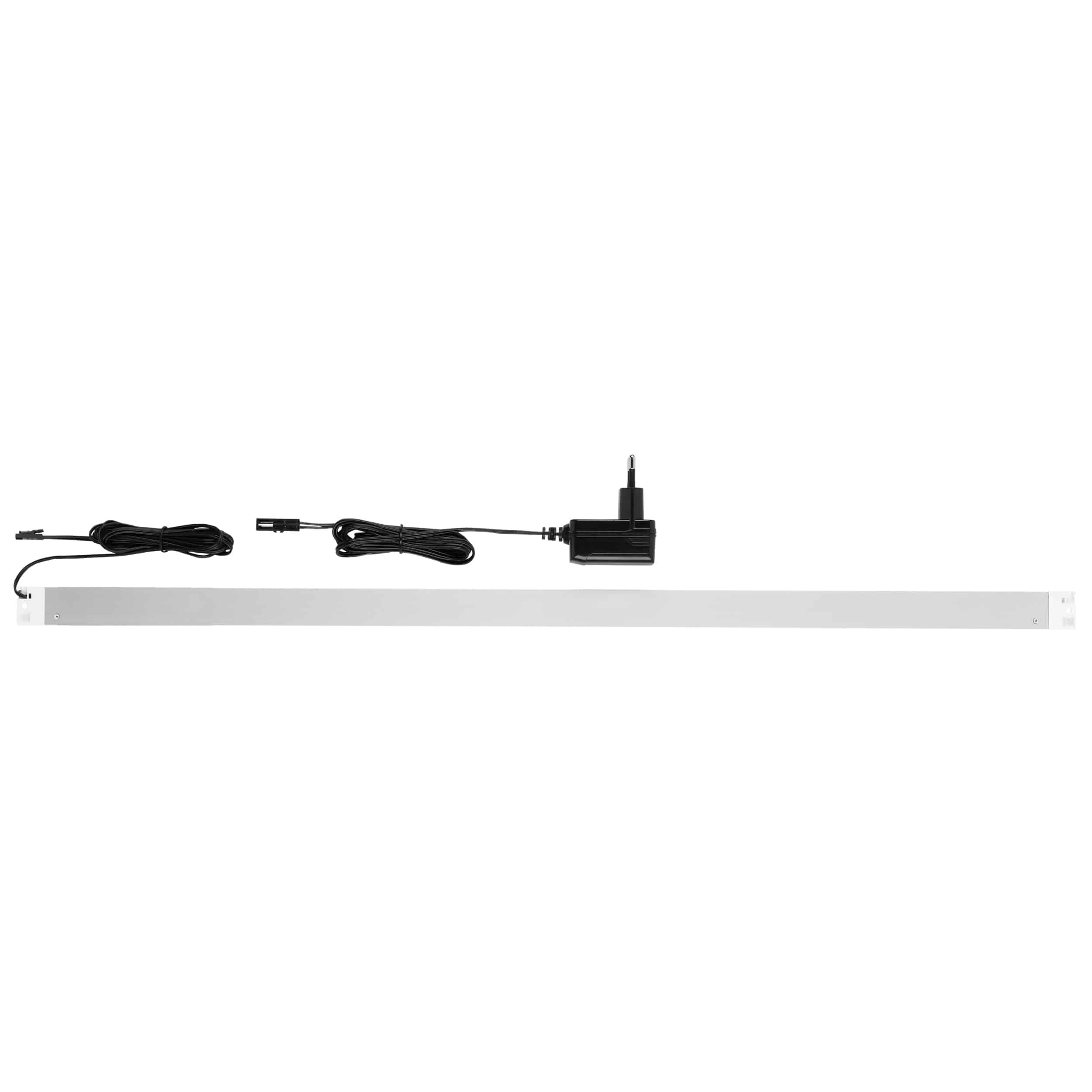 Ein langes, schmales LED-Streifenlicht mit Netzteil und Verbindungskabel, geeignet für die Beleuchtung unter Schränken oder als Akzentbeleuchtung.