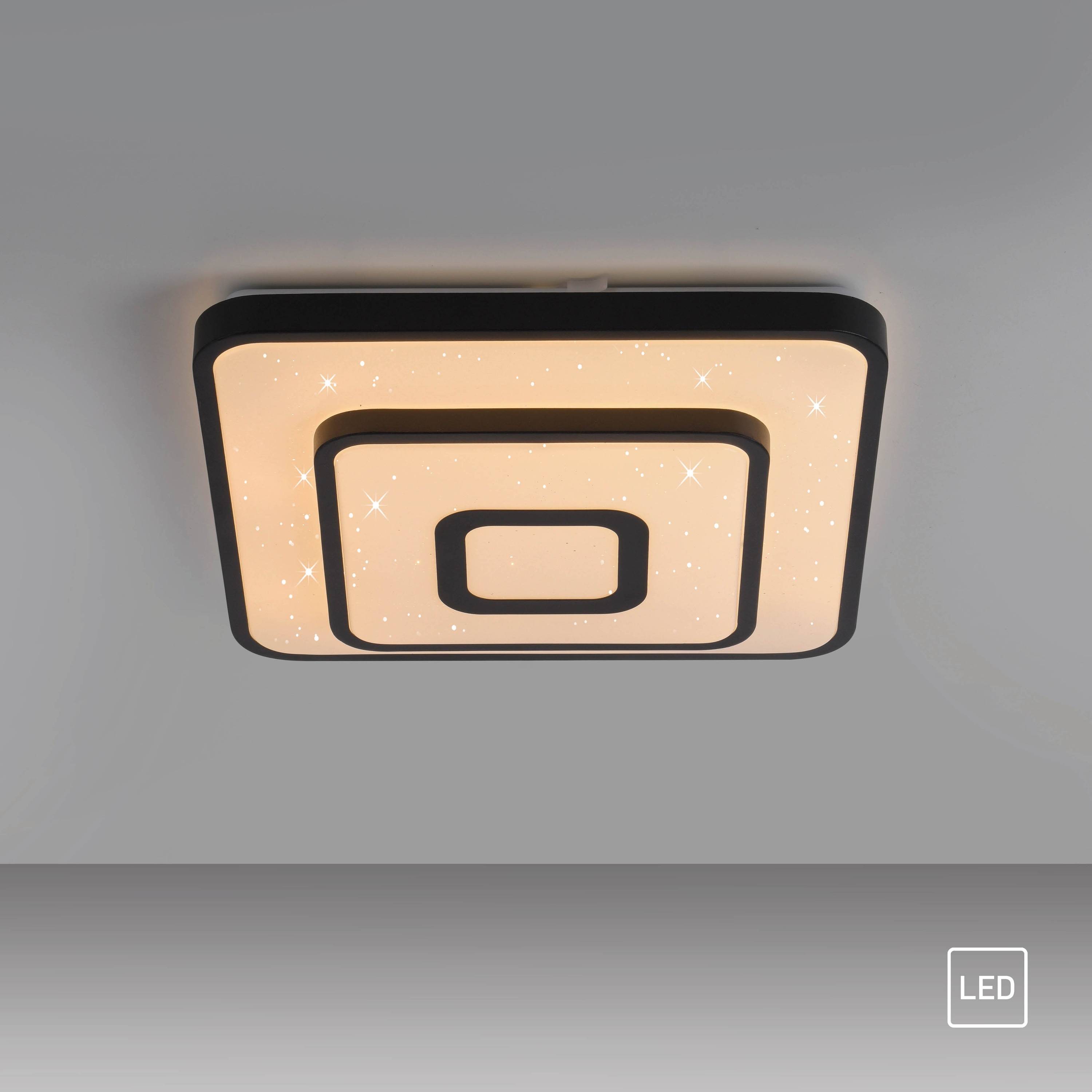 Eine quadratische LED-Deckenleuchte mit konzentrischen rechteckigen Mustern verbreitet einen warmen Glanz und schafft eine moderne und elegante Atmosphäre.