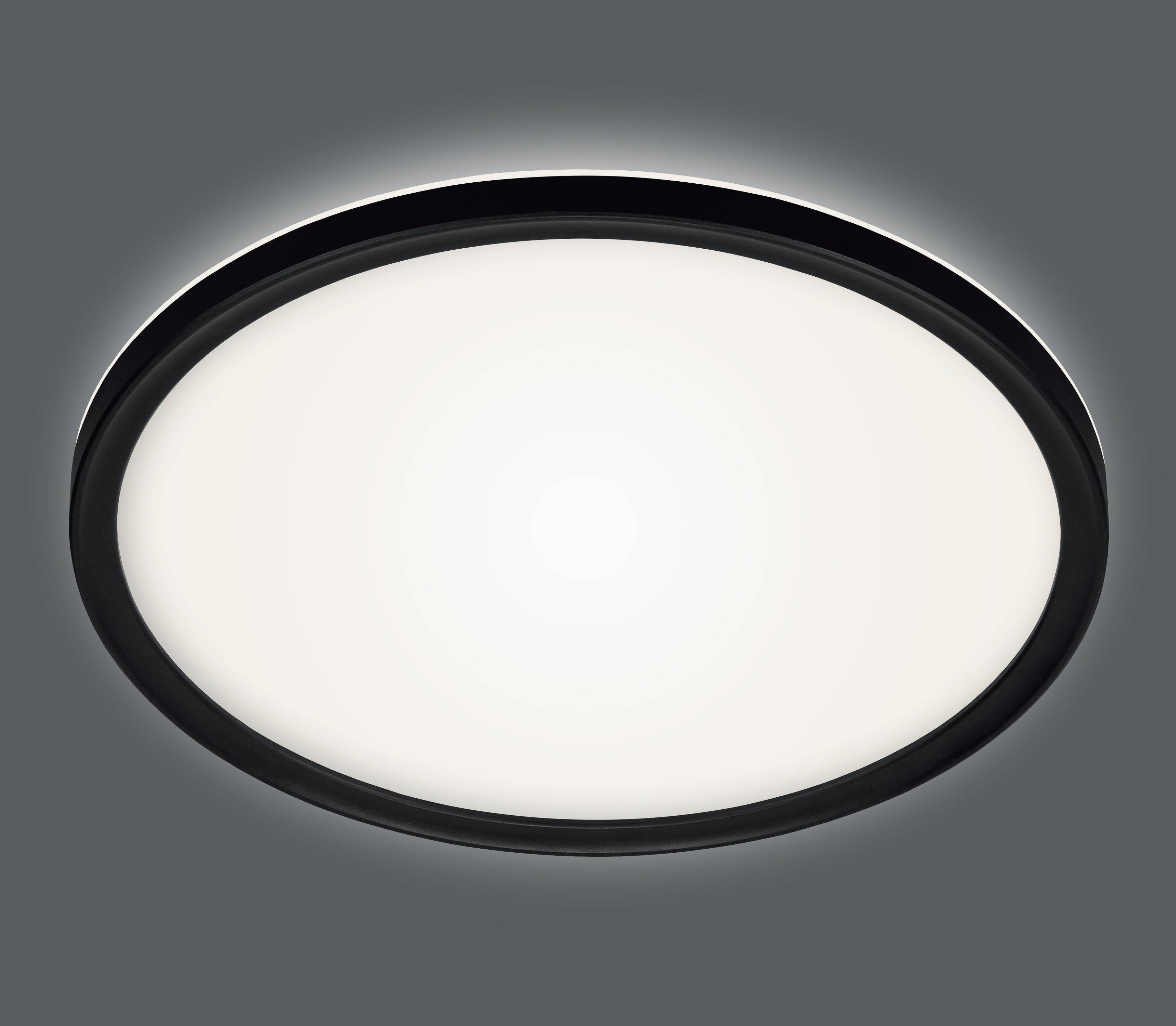 Eine runde Deckenlampe mit einem schwarzen Rand ist auf einer grauen Oberfläche montiert und verbreitet ein weiches, gleichmäßiges Leuchten.