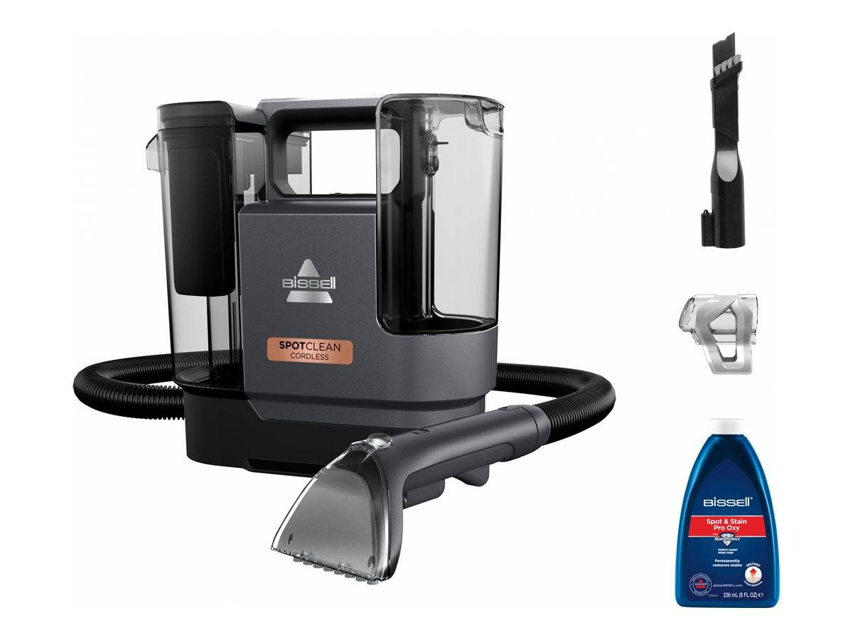 Bissell SpotClean Cordless tragbarer Teppichreiniger mit Schlauch, tragbarem Reinigungskopf, Bürstenaufsatz und Reinigungsmittelflasche auf weißem Hintergrund dargestellt.