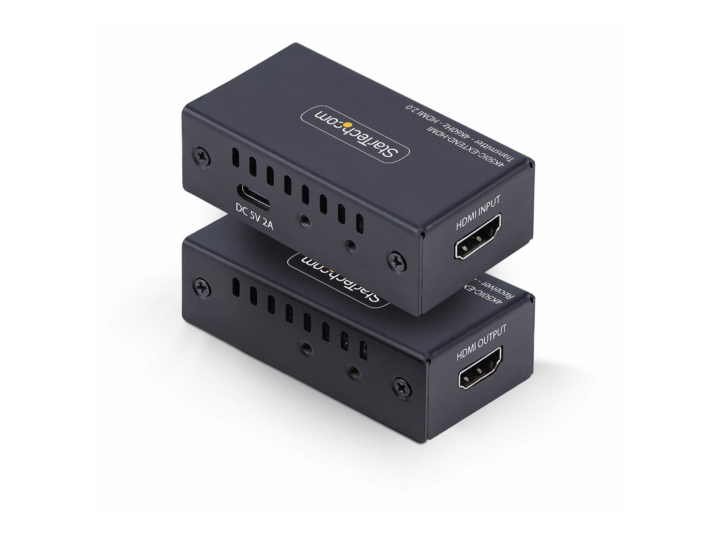 Zwei übereinander gestapelte schwarze HDMI-Verlängerungsboxen mit StarTech.com-Beschriftung, die HDMI-Ein-/Ausgänge und eine 5V-Gleichstrom-Stromversorgungsbuchse auf weißem Hintergrund zeigen.