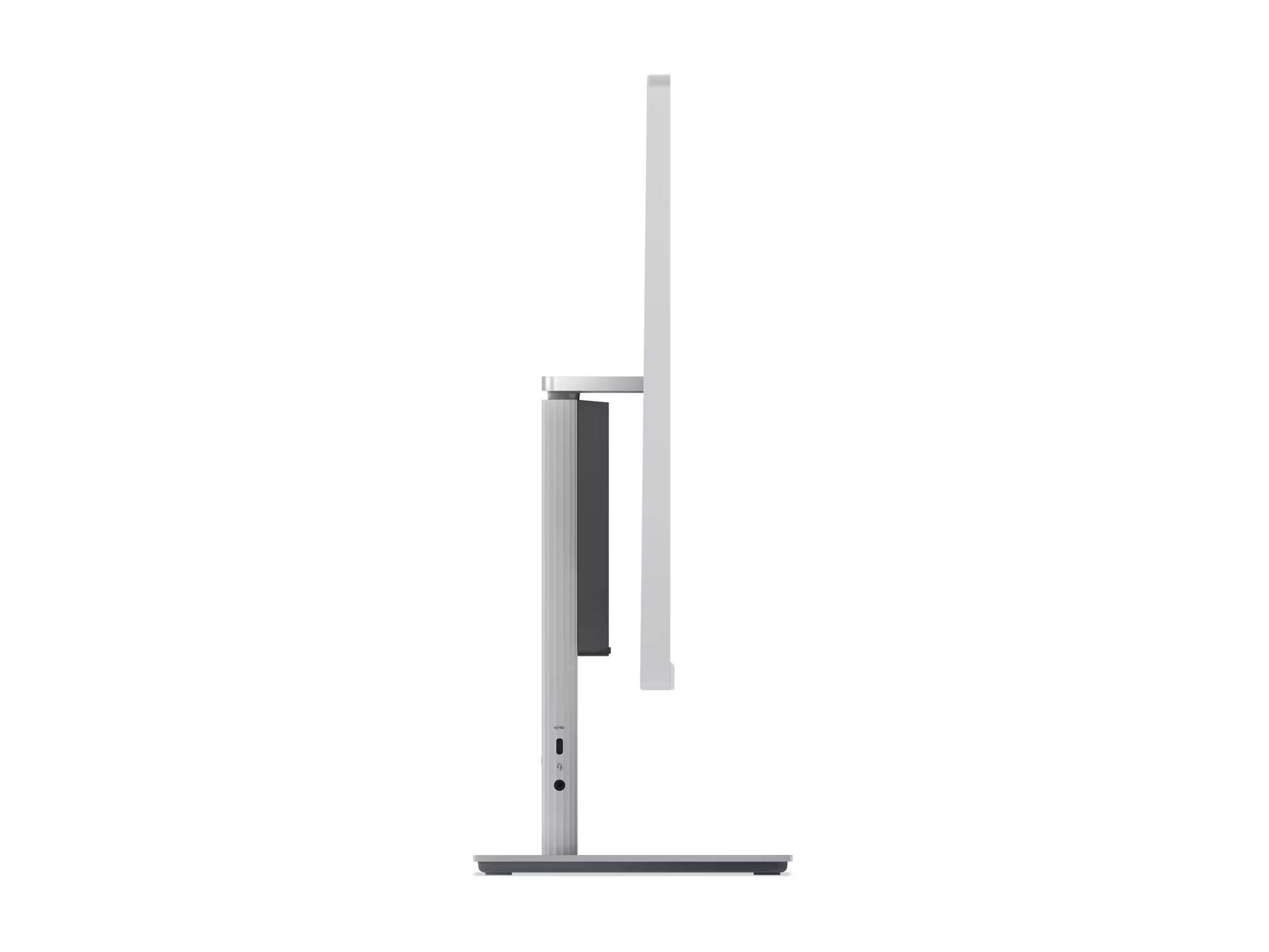 Seitenansicht eines schlanken, modernen Computermonitors mit einem metallischen Ständer, der sein dünnes Profil und minimalistisches Design zur Geltung bringt.