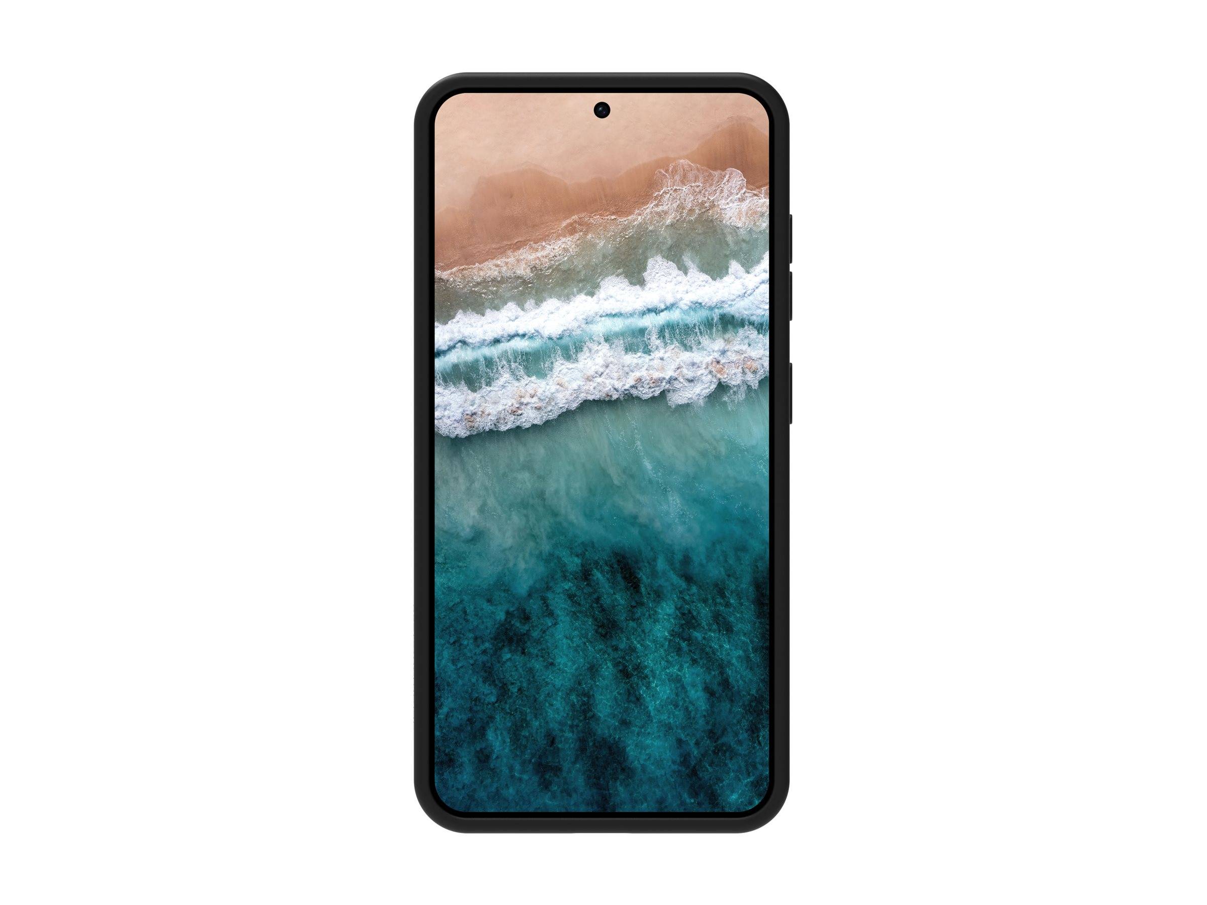 Ein schwarzes Smartphone von vorne gezeigt mit einer Strand- und Meereswellen-Tapete auf dem Bildschirm.